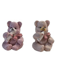 A mini 3D vintage bear with a bottle, in a beige and gray color palette, holding a small white bottle.