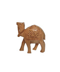 Decorative wooden camel statue with carved patterns