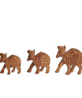 Artisan wooden camel sculpture with patterned saddle design