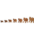 Handmade wooden camel decor statue isolated on white