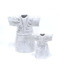Porcelain kaftan-shaped canister with Arabic calligraphy – elegant Arabic decor blending function and heritage.
