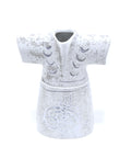 Porcelain kaftan-shaped canister with Arabic calligraphy – elegant Arabic decor blending function and heritage.