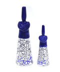 Porcelain dervish figurine with Arabic calligraphy accents – graceful Islamic décor blending spirituality and art.