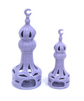 Porcelain candle holder shaped like a minaret – elegant Islamic décor accent with hand-painted details.