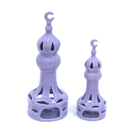 Porcelain candle holder shaped like a minaret – elegant Islamic décor accent with hand-painted details.