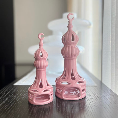 Porcelain candle holder shaped like a minaret – elegant Islamic décor accent with hand-painted details.