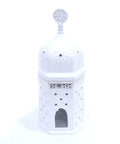 Porcelain candle holder shaped like a mosque with arabesque design – refined Islamic décor for spiritual ambiance.
