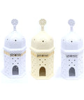 Porcelain candle holder shaped like a mosque with arabesque design – refined Islamic décor for spiritual ambiance.