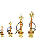 Set of four decorative hookahs with gold and multicolored design on a white background