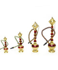 Four blue, golden and red hookah pipes with decorative metal tops and flexible hoses, displayed against a plain white background.