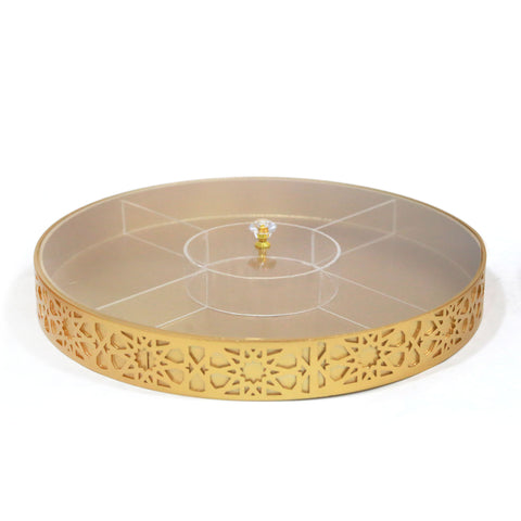 A beautifully carved wooden tray with an arabesque pattern, featuring a clear acrylic cover and internal divisions, displayed on a stand.