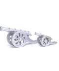 A silver resin figurine of a cannon, part of the 'FERQA' collection.