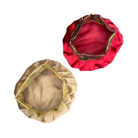 A beige velvet pouch with white background