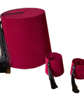 Red fez hats with black tassels on a white background