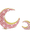 Porcelain moon décor with intricate arabesque motif – elegant Arabic décor with spiritual and artistic flair.