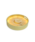 Decorative Golden plate with 'Ramadan Kareem' text and crescent moon design on a white background