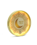 A Decorative plate with 'Ramadan Kareem' text and crescent moon design.