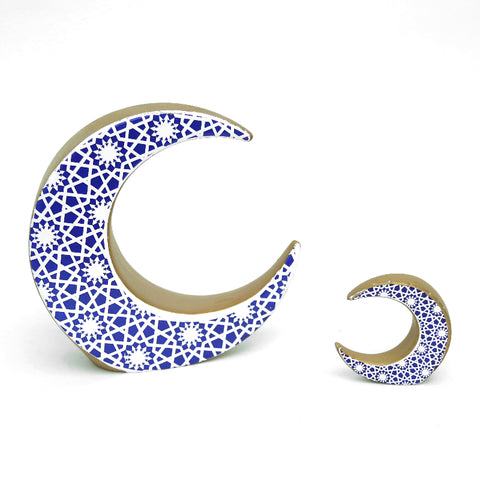 Porcelain moon décor with intricate arabesque motif – elegant Arabic décor with spiritual and artistic flair.