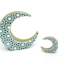 Porcelain moon décor with intricate arabesque motif – elegant Arabic décor with spiritual and artistic flair.
