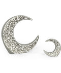 Porcelain moon-shaped figurine with oriental pattern – celestial Arabic décor with artistic cultural detailing.