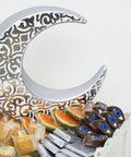 Porcelain moon-shaped figurine with oriental pattern – celestial Arabic décor with artistic cultural detailing.