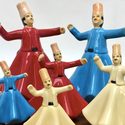 Porcelain figurine of a Mawlawi whirling dervish in white attire – graceful Islamic décor inspired by Sufi tradition.