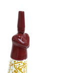 Porcelain dervish figurine with Arabic calligraphy accents – graceful Islamic décor blending spirituality and art.