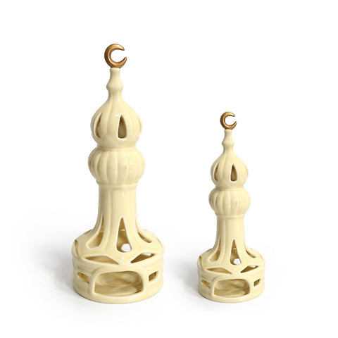 Porcelain candle holder shaped like a minaret – elegant Islamic décor accent with hand-painted details.