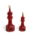 Porcelain candle holder shaped like a minaret – elegant Islamic décor accent with hand-painted details.