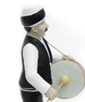 Figurine of traditional Ramadan mesaharati drummer – nostalgic Islamic décor accent from Arab heritage.