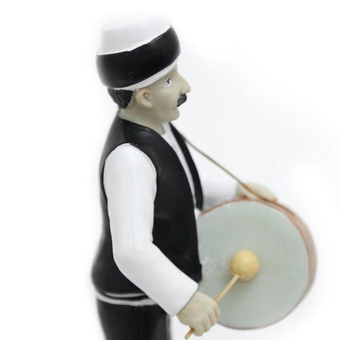 Figurine of traditional Ramadan mesaharati drummer – nostalgic Islamic décor accent from Arab heritage.
