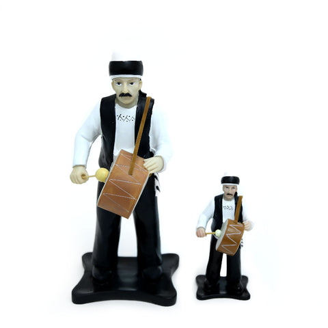 Figurine of traditional Ramadan mesaharati drummer – nostalgic Islamic décor accent from Arab heritage.