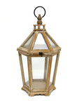 A large wooden lantern with a hexagonal shape and a metal handle, featuring clear glass panels and a dome top.