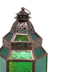 Decorative lantern with green glass panels and bronze metalwork on a white background