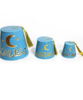 Fez-shaped porcelain canister with gold tassel and Ramadan Kareem calligraphy – elegant Ramadan décor accent.