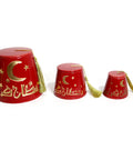Fez-shaped porcelain canister with gold tassel and Ramadan Kareem calligraphy – elegant Ramadan décor accent.